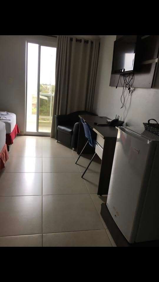 Quarto com TV e frigobar